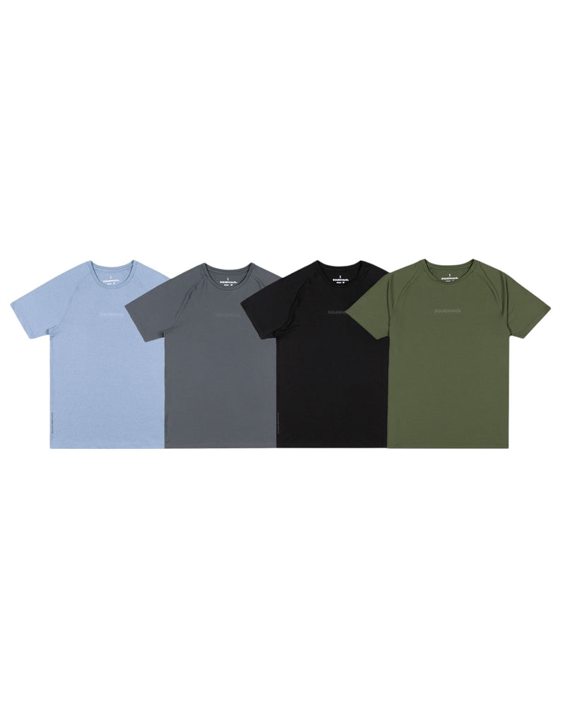 Four Squidhaus shirts in blue, gray, black, and green. Comfortable and stylish unisex tees for everyday wear.